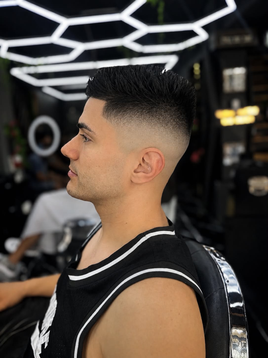 Textured flattop with a clean fade by Kritikos Barbershop